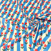 Tissu habillement imperméable, Rayures bleues & tulipes roses rouges - STANDARD 100 by OEKO-TEX - tissuspipi.com
