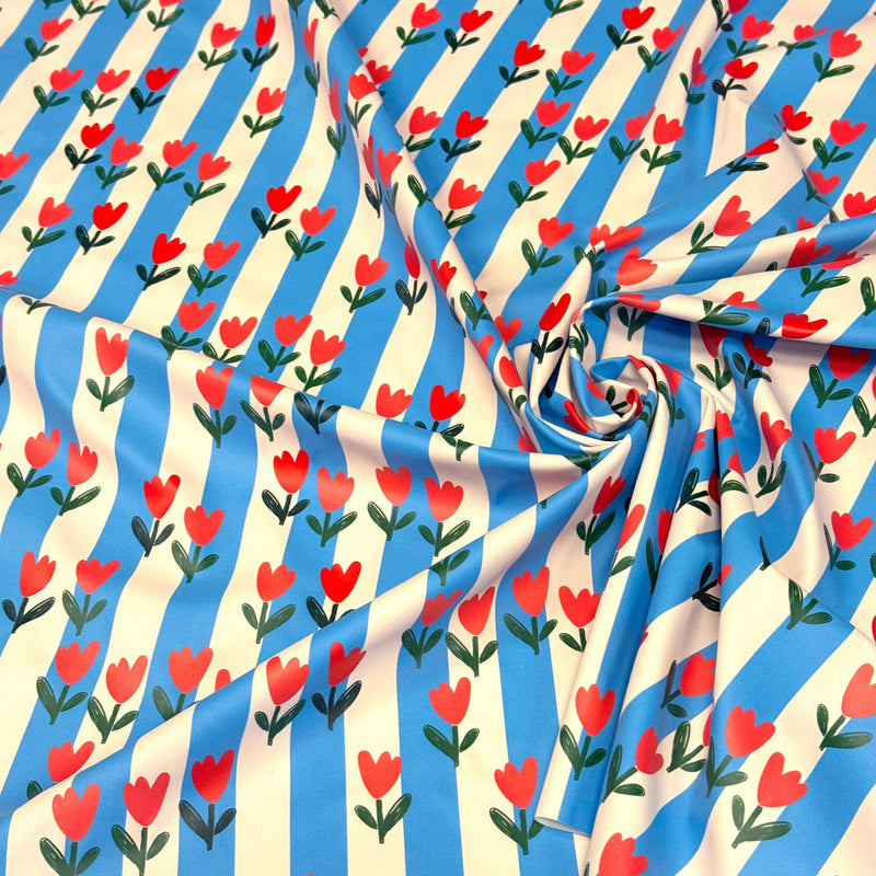 Tissu habillement imperméable, Rayures bleues & tulipes roses rouges - STANDARD 100 by OEKO-TEX - tissuspipi.com