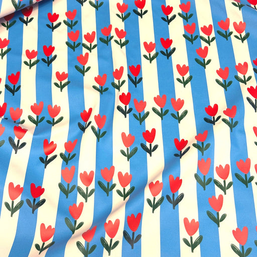 Tissu habillement imperméable, Rayures bleues & tulipes roses rouges - STANDARD 100 by OEKO-TEX - tissuspipi.com