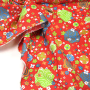 Tissu cotonnade SEVENTIES rouge et formes psychédéliques oranges, bleues, vertes - tissuspipi.com