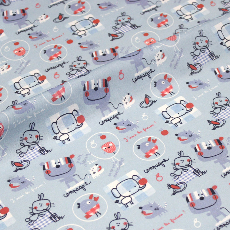 Tissu cotonnade enfant animaux en pique-nique à la campagne sur fond bleu ciel - tissuspipi.com