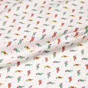 Tissu cotonnade enfant aux petits toucans multicolores sur fond blanc - tissuspipi.com