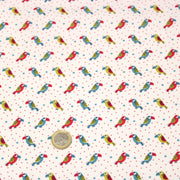 Tissu cotonnade enfant aux petits toucans multicolores sur fond blanc - tissuspipi.com