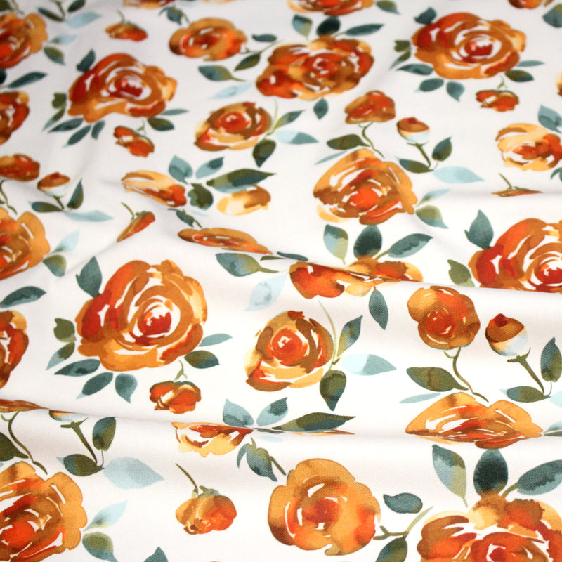 Tissu gabardine coton imprimée blanc aux roses oranges façon aquarelle - tissuspipi.com