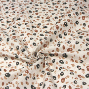 Tissu cotonnade LEOPARD, écru et taches léopard noires, roses, ocres - OEKO - TEX STANDARD 100 - tissuspipi.com
