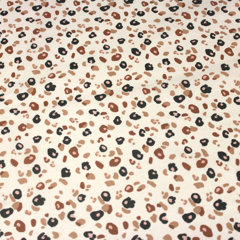 Tissu cotonnade LEOPARD, écru et taches léopard noires, roses, ocres - OEKO - TEX STANDARD 100 - tissuspipi.com