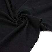 Tissu lainage épais et souple, noir uni, fabrication italienne - tissuspipi.com