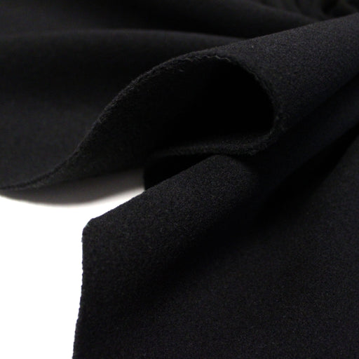 Tissu lainage épais et souple, noir uni, fabrication italienne - tissuspipi.com