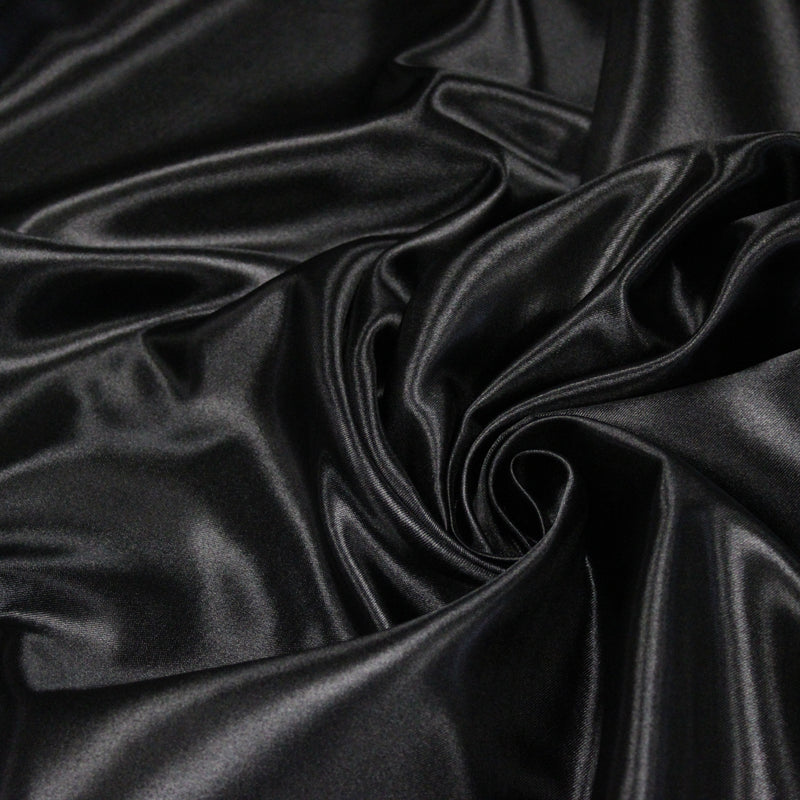 Tissu satin polyester noir uni, fabrication italienne - tissuspipi.com