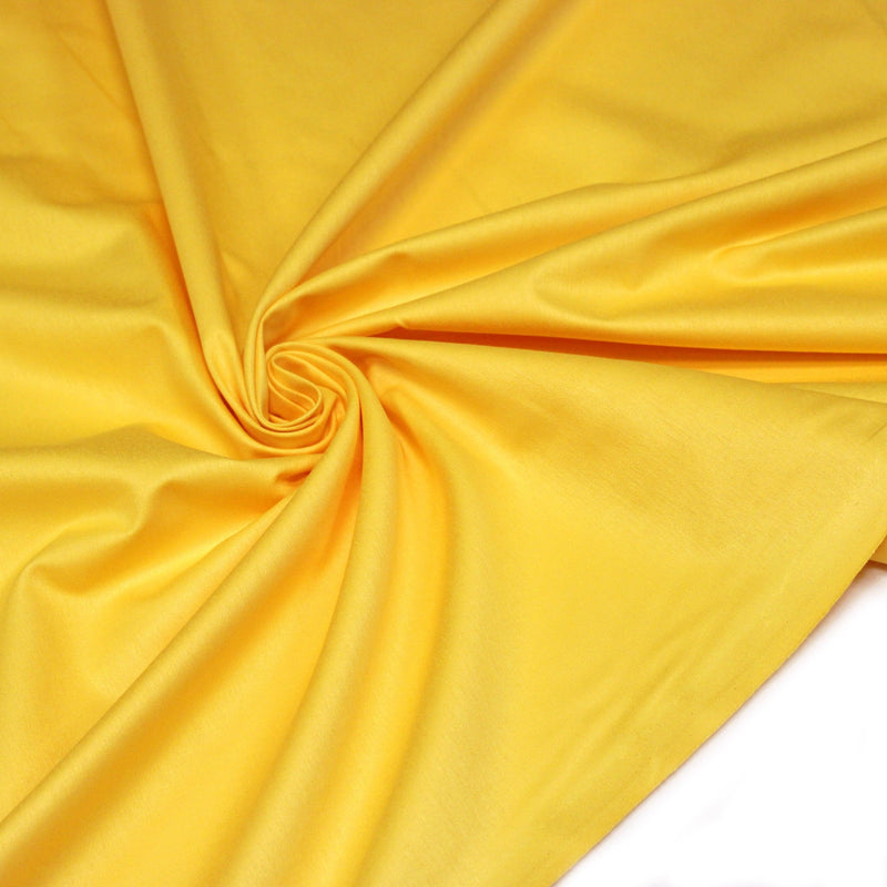 Tissu cotonnade jaune bouton d'or uni - COLLECTION LES BASIQUES - tissuspipi.com