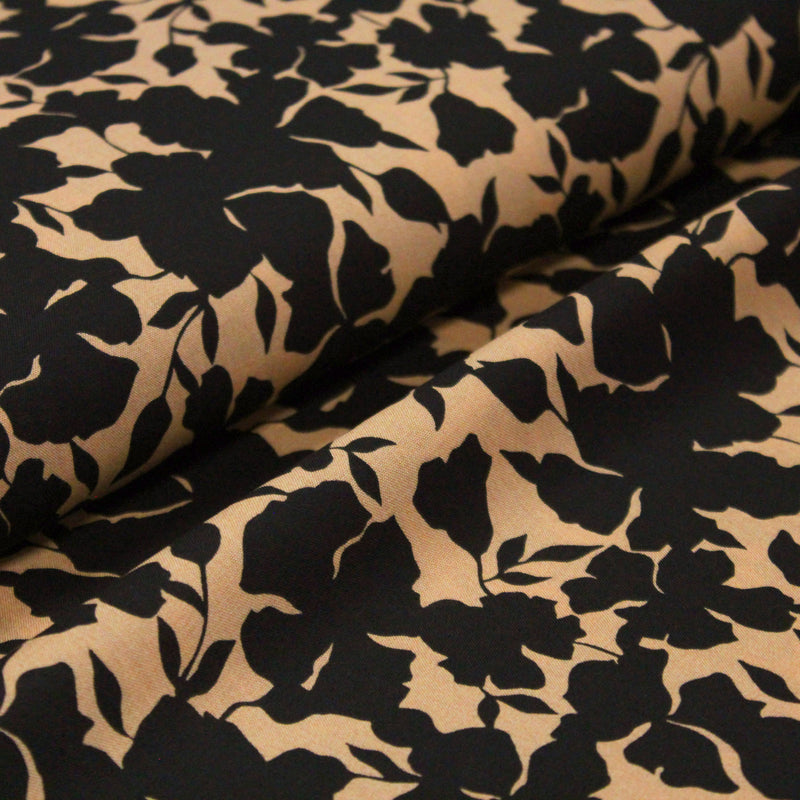 Tissu viscose fluide ocre aux feuilles noires façon silhouette - OEKO-TEX STANDARD 100 - tissuspipi.com