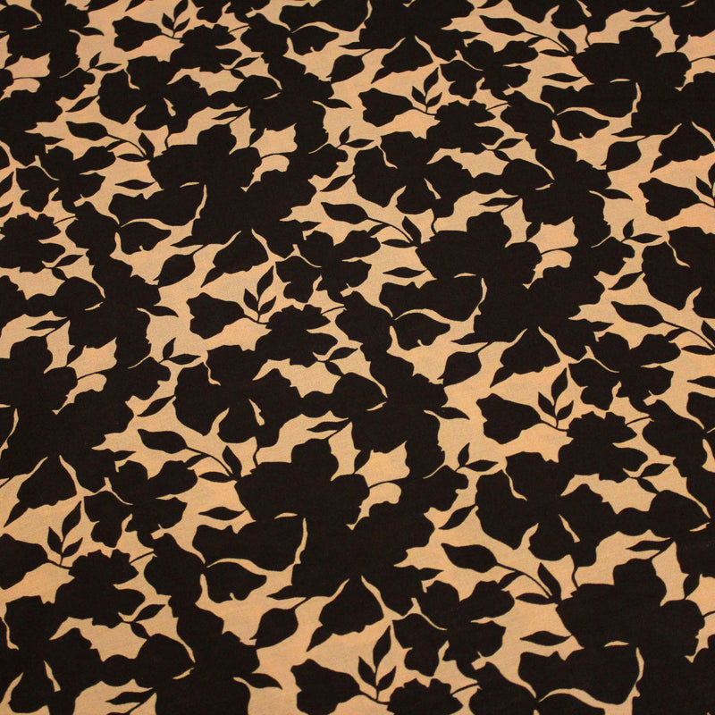 Tissu viscose fluide ocre aux feuilles noires façon silhouette - OEKO-TEX STANDARD 100 - tissuspipi.com