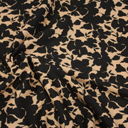 Tissu viscose fluide ocre aux feuilles noires façon silhouette - OEKO-TEX STANDARD 100 - tissuspipi.com