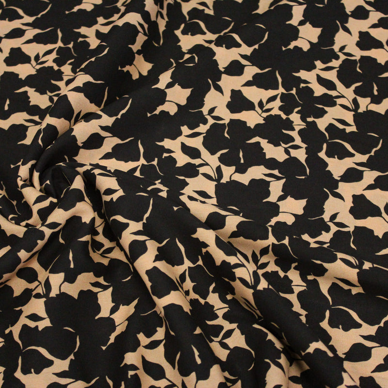 Tissu viscose fluide ocre aux feuilles noires façon silhouette - OEKO-TEX STANDARD 100 - tissuspipi.com