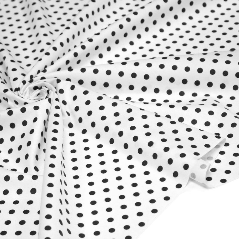 Tissu popeline de coton blanc à pois noirs 8mm - COLLECTION POLKA DOT - tissuspipi.com
