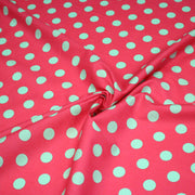 Tissu popeline de coton rouge magenta à pois vert clair 18mm - COLLECTION POLKA DOT - tissuspipi.com