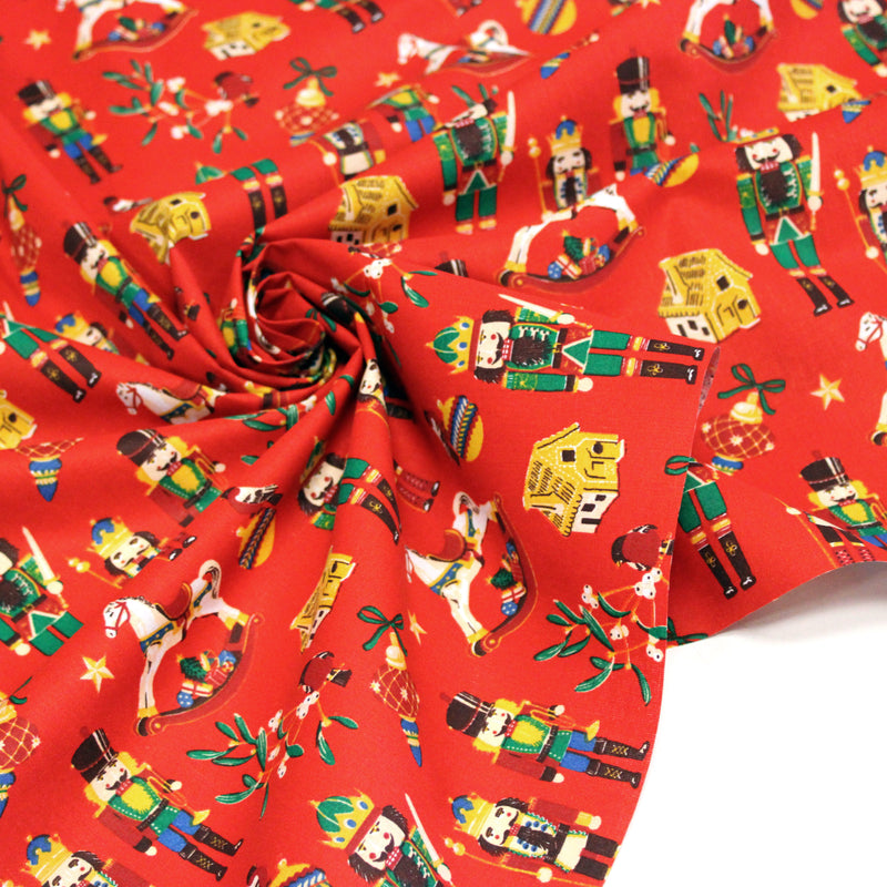 Tissu cotonnade de NOËL – Casse-noisettes et jouets d’antan, fond rouge - OEKO-TEX STANDARD 100