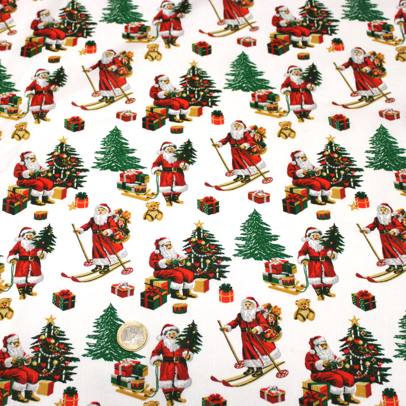 Tissu cotonnade de NOËL, le père Noël à ski, fond blanc - OEKO-TEX STANDARD 100