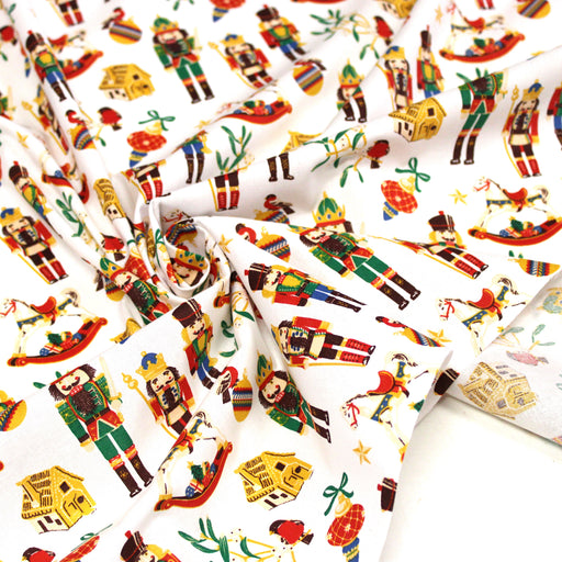 Tissu cotonnade de NOËL – Casse-noisettes et jouets d’antan, fond blanc - OEKO-TEX STANDARD 100 - tissuspipi.com