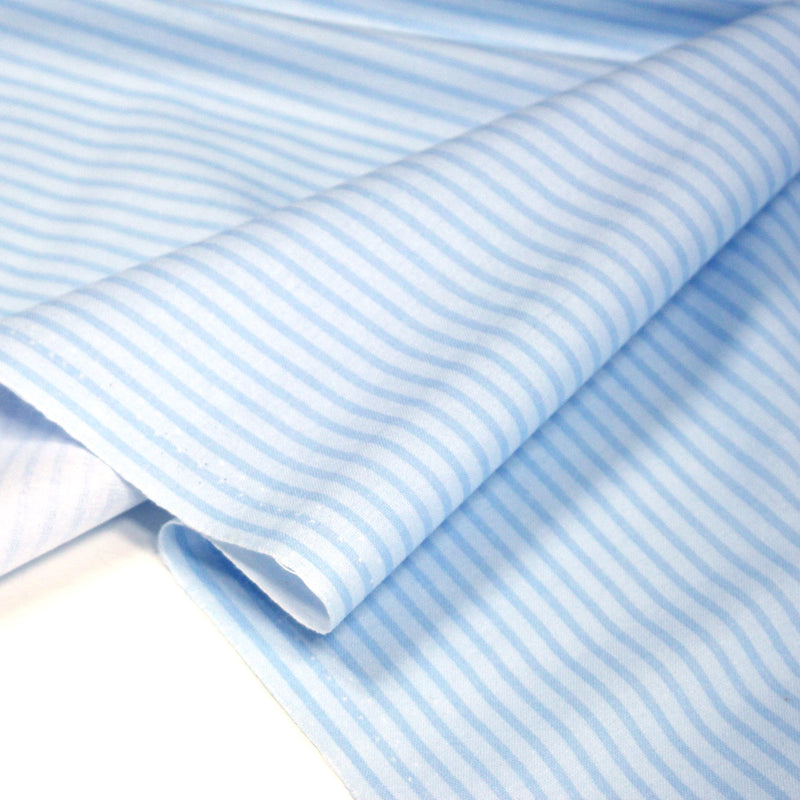 Tissu cotonnade aux rayures bleu ciel - tissuspipi.com