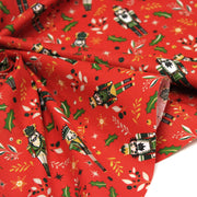 Tissu cotonnade de NOËL, Casse-noisettes, houx et feuillages ocres, fond rouge - OEKO-TEX STANDARD 100 - tissuspipi.com
