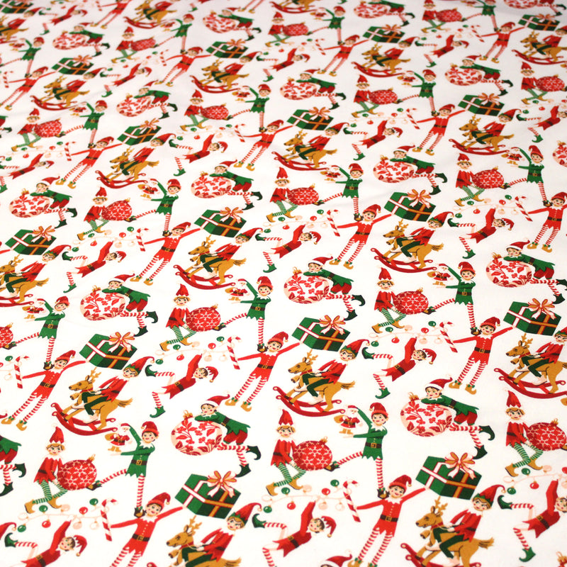Tissu cotonnade de NOËL – La farandole des lutins, fond blanc - OEKO-TEX STANDARD 100 - tissuspipi.com
