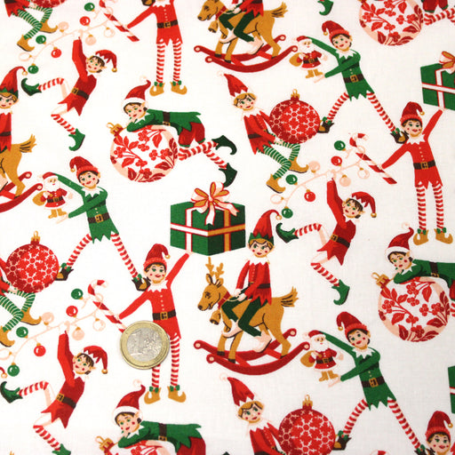 Tissu cotonnade de NOËL – La farandole des lutins, fond blanc - OEKO-TEX STANDARD 100 - tissuspipi.com