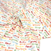 Tissu popeline coton blanc aux noms de ville multicolores, collection VOYAGE - tissuspipi.com