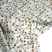 Tissu popeline coton, bleu ciel aux fines fleurs ocre et tiges vertes - Collection britannique - tissuspipi.com