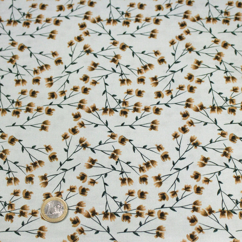 Tissu popeline coton, bleu ciel aux fines fleurs ocre et tiges vertes - Collection britannique - tissuspipi.com