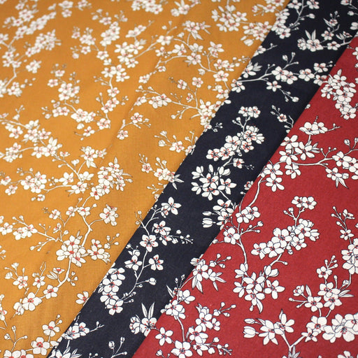 Tissu cotonnade HANA HANA, fleurs de cerisier japonais noir & blanc, fond rouge / bleu / jaune - OEKO - TEX - tissuspipi.com