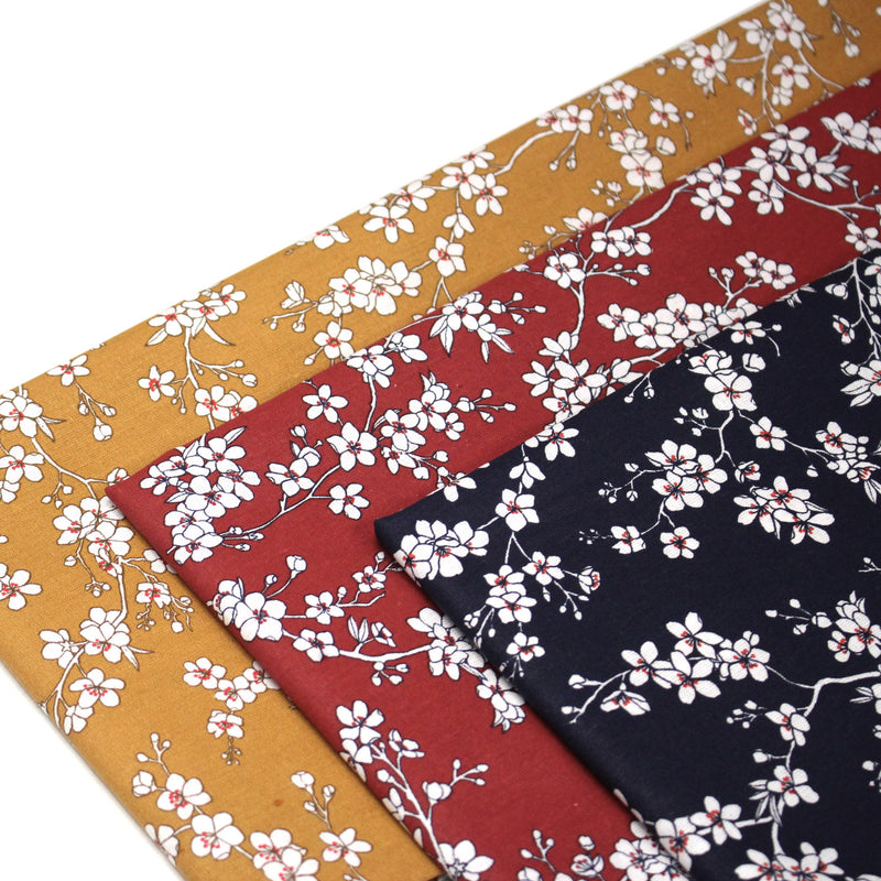 Tissu cotonnade HANA HANA, fleurs de cerisier japonais noir & blanc, fond rouge / bleu / jaune - OEKO - TEX - tissuspipi.com