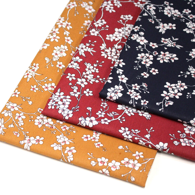 Tissu cotonnade HANA HANA, fleurs de cerisier japonais noir & blanc, fond rouge / bleu / jaune - OEKO - TEX - tissuspipi.com