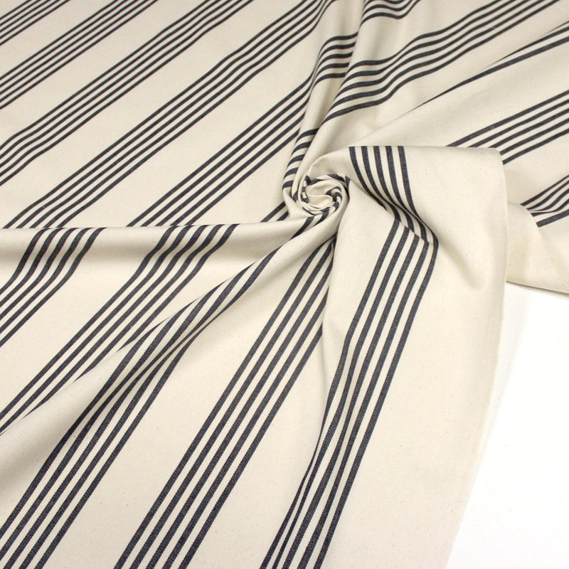 Tissu toile à matelas de coton LE TOUQUET écru aux rayures : bleu, rouge, noir, gris, sable - tissuspipi.com