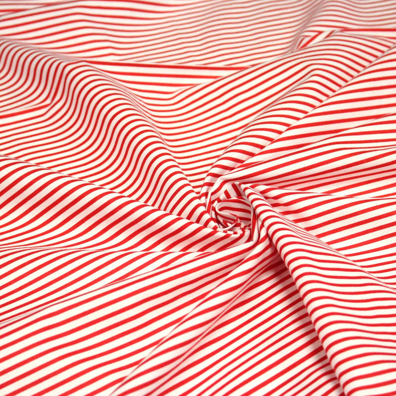 Tissu cotonnade aux rayures rouges et blanches - tissuspipi.com