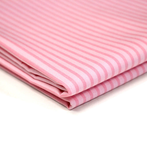 Tissu cotonnade aux rayures roses - tissuspipi.com