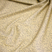 Tissu cotonnade BAMBURGH aux fines fleurs grises, fond crème - tissuspipi.com