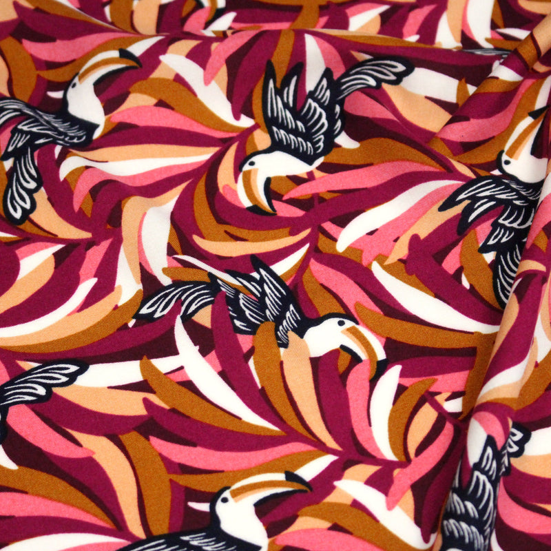 Tissu viscose fluide, motif floral & toucans : tons prune ou tons marine - OEKO - TEX STANDARD 100 - tissuspipi.com