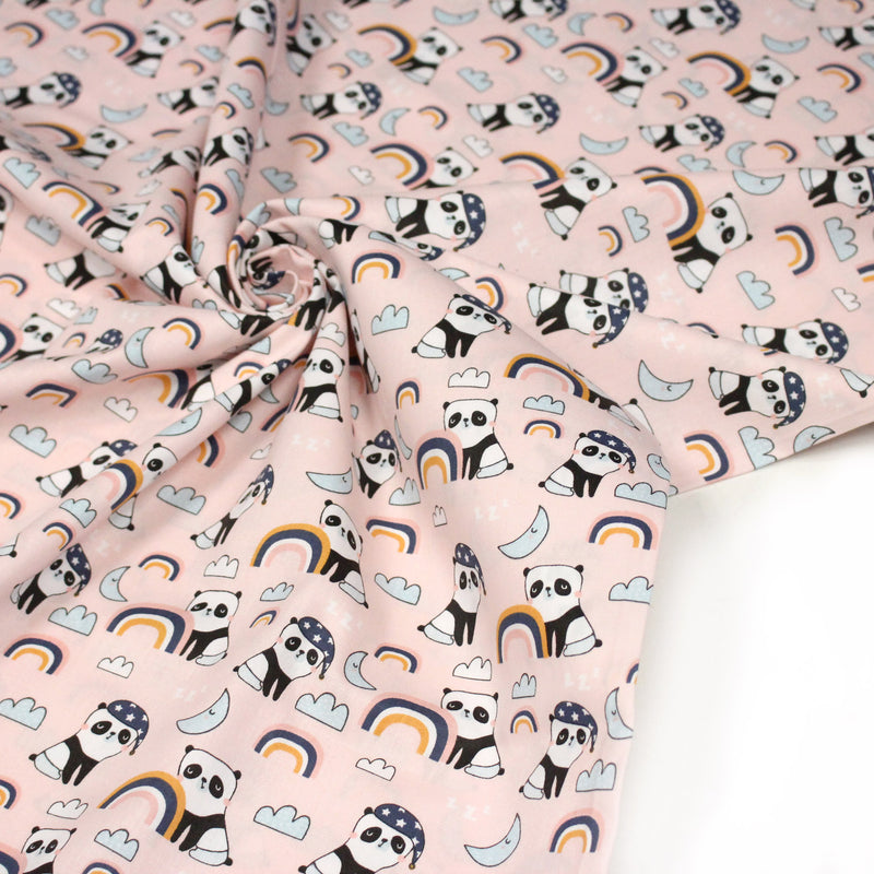 Tissu popeline coton ENFANT rose aux pandas endormis, arcs en ciel et nuages - tissuspipi.com