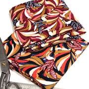 Tissu viscose fluide, motif floral & toucans : tons prune ou tons marine - OEKO - TEX STANDARD 100 - tissuspipi.com