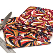 Tissu viscose fluide, motif floral & toucans : tons prune ou tons marine - OEKO - TEX STANDARD 100 - tissuspipi.com