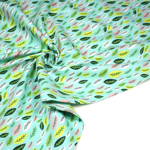 Tissu popeline coton vert aux feuilles vertes, jaunes, roses - tissuspipi.com