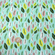 Tissu popeline coton vert aux feuilles vertes, jaunes, roses - tissuspipi.com