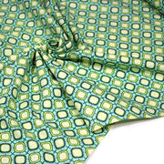 Tissu popeline coton vert aux formes géométriques vertes et jaunes - tissuspipi.com