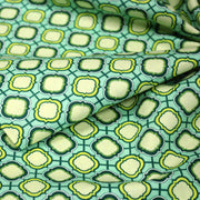 Tissu popeline coton vert aux formes géométriques vertes et jaunes - tissuspipi.com