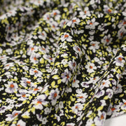 Tissu Viscose crêpe noir fleuri jaune blanc violet orange - tissuspipi.com