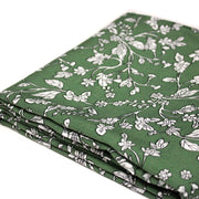 Tissu viscose fluide, fines fleurs blanches et noirs, fond ocre ou fond vert - tissuspipi.com