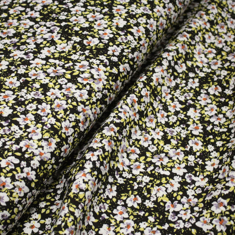 Tissu Viscose crêpe noir fleuri jaune blanc violet orange - tissuspipi.com