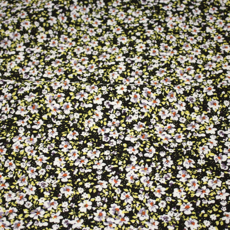 Tissu Viscose crêpe noir fleuri jaune blanc violet orange - tissuspipi.com