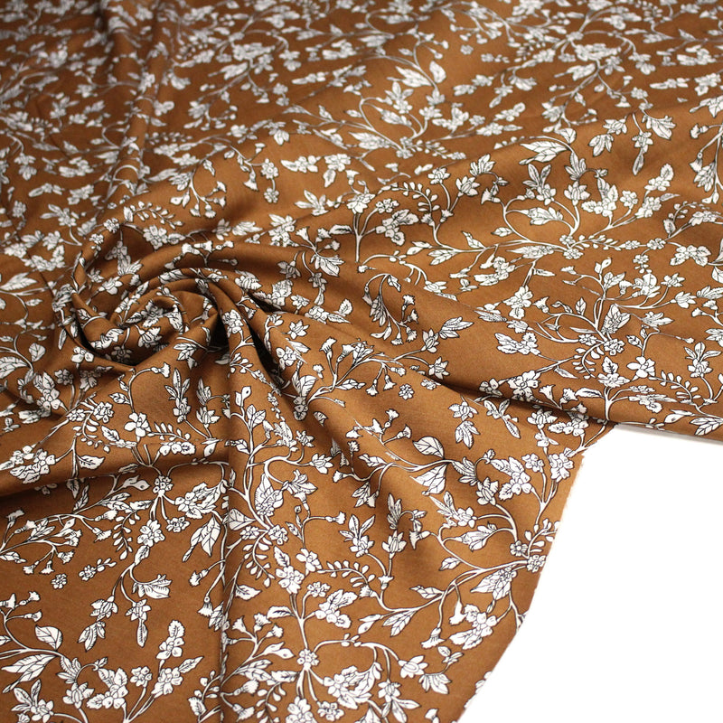 Tissu viscose fluide, fines fleurs blanches et noirs, fond ocre ou fond vert - tissuspipi.com
